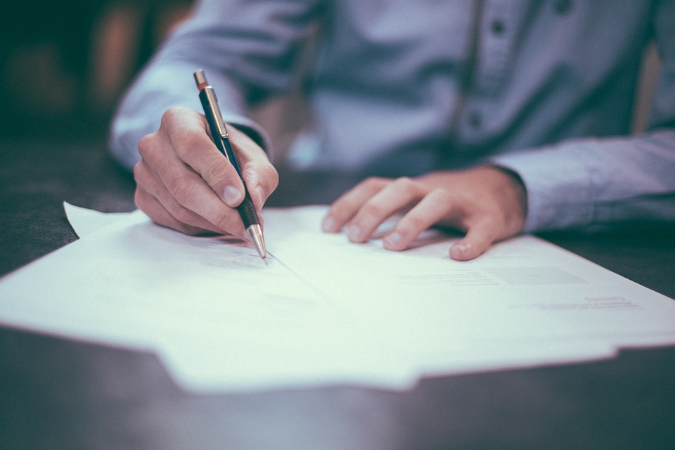 man and pen